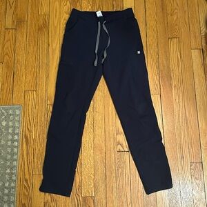 Women’s navy blue, skinny Figs scrub bottoms, used, minor imperfections.